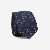 Γραβάτα μεταξωτή στενή με μπλε βάση και μικρό σχέδιο σε γήινες αποχρώσεις, σετ με μαντηλάκι