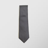 Φαρδιά γραβάτα | μεταξωτή σε γκρί βάση με μικρό σχεδιασμό και μαύρη λεπτομέρεια