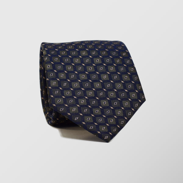 Φαρδιά γραβάτα | μεταξωτή σε μπλε βάση με μικρό σχεδιασμό σε μορφή ρόμβου και ταμπά λεπτομέρεια