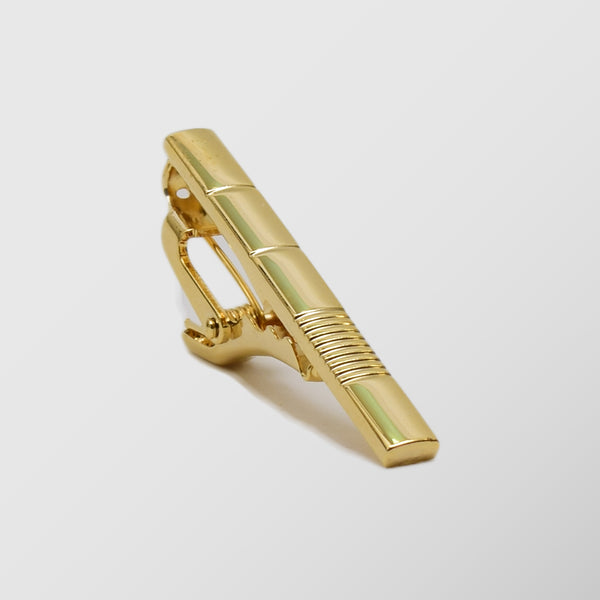 Κλίπ γραβάτας | σε χρυσή απόχρωση με κάθετο ριγέ σχεδιασμό